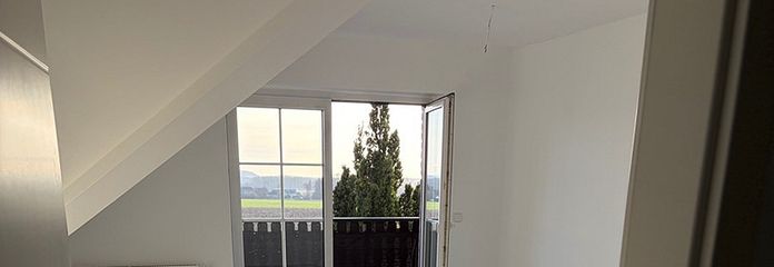 Appartement de 3 pièces dans un cadre idyllique avec jardin et 2 places de stationnement