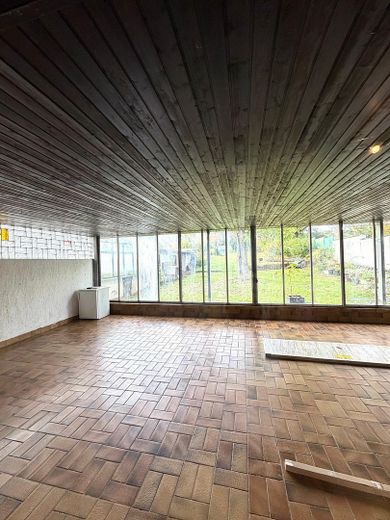 Vielseitiges Mehrfamilienhaus mit 3 Einheiten & attraktivem Baugrundstück – Wintergarten EG