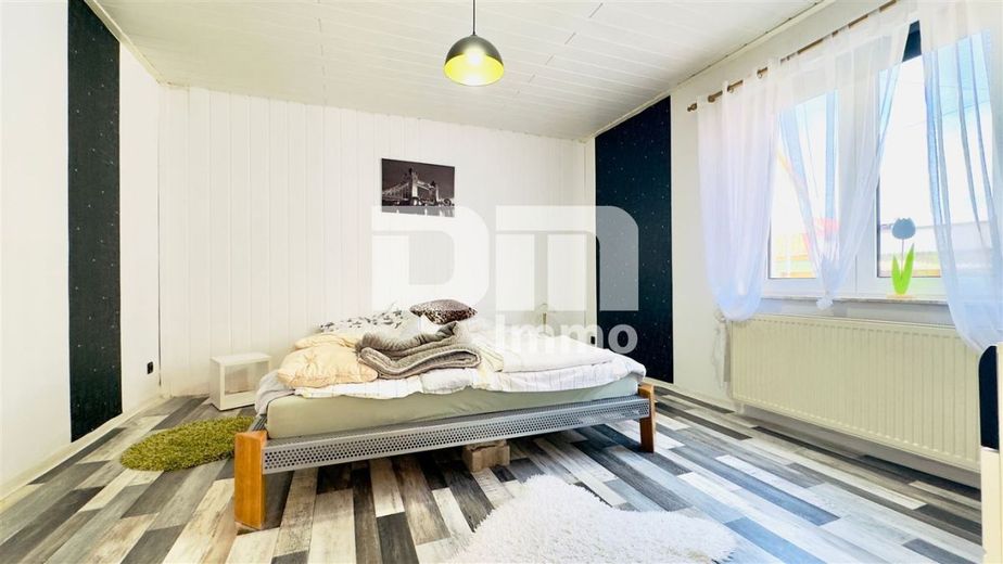 Vielseitiges Raumwunder mit Potenzial: Ein- bis Zweifamilienhaus im Herzen von Amt Creuzburg – EG Schlafzimmer