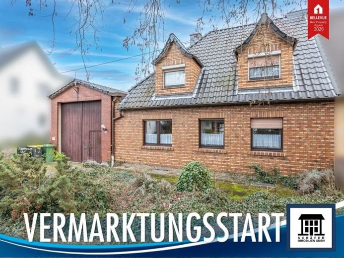 Einseitig angebautes Familienhaus mit besonderer Baumöglichkeit - attraktives Entwicklungspotenzial! – Foto 1
