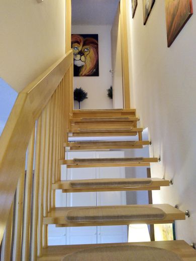 Holztreppe zum OG