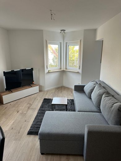 Appartement attrayant en première occupation, aux finitions haut de gamme, disponible immédiatement – Wohnzimmer