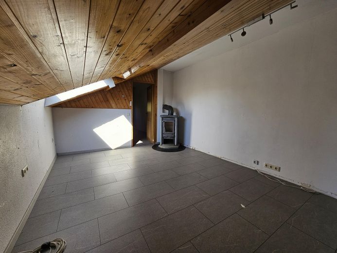 Familienfreundliches Einfamilienhaus mit großem Garten in Mannheim Gartenstadt – Wohnzimmer oben