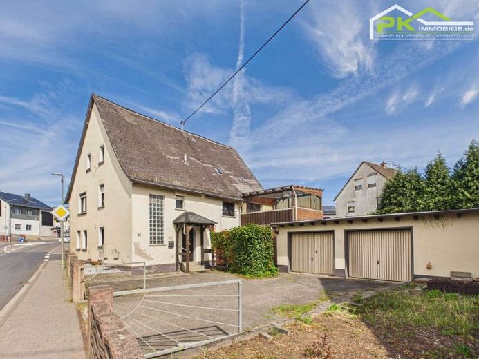 Einfamilienhaus mit Doppelgarage - Sanierungsobjekt im Ortskern von Nentershausen – Foto 1