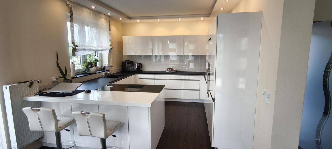 Detached single-family house with granny flat in an unobstructed location on the edge of town – Küche Eg