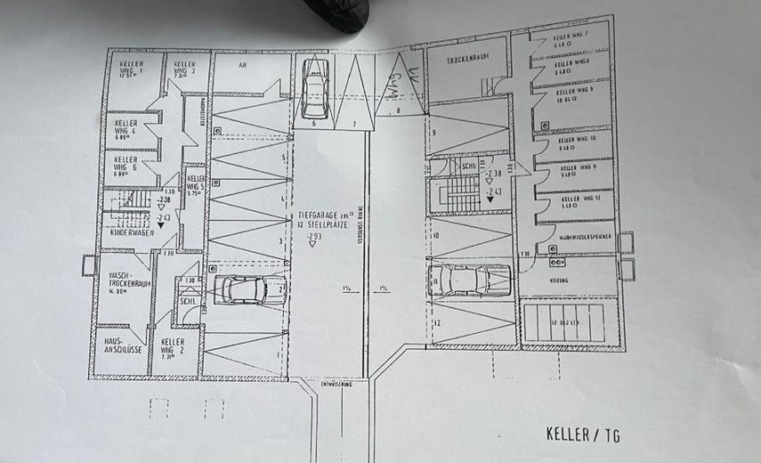 Stadtnahe lichtdurchflutete Maisonettewohnung mit Südbalkon am Waldrand – Grundriss Tiefgarage