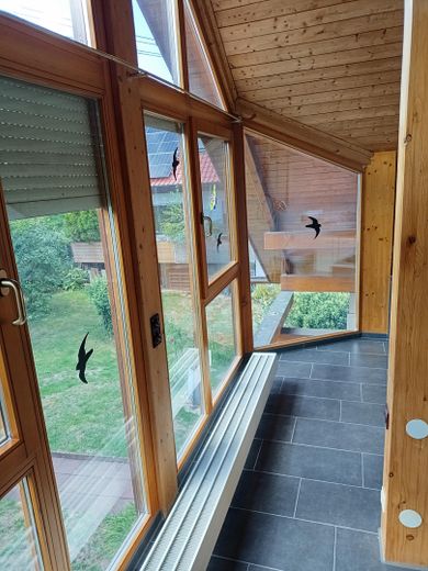 Einzigartiges Holzhaus im Grünen in Randlage und doch zentral – Foto 9