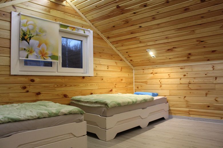 Göl kenarında lüks ev_ kütük ev_ tatil evi_ min. % 7 getiri – eine von 2 Schlafzimmern im OG