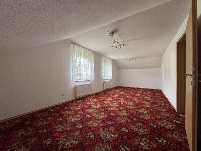 Casa bifamiliar atractiva – ideal para familias o inversores – 1.OG Wohnzimmer