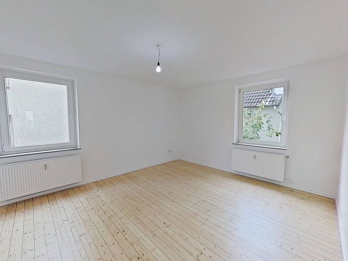 Charme&Gemütlichkeit: Schöne 2-Zimmer-Wohnung mit modernem Wannenbad in Bielefeld-Mitte – Ansicht I: Wohn- und Esszimmer