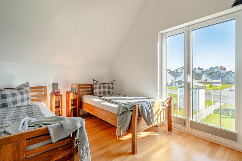 Semi-detached house in the Baltic Sea resort Olpenitz Kappeln, waterside location with large plot – Schlafzimmer Kinder