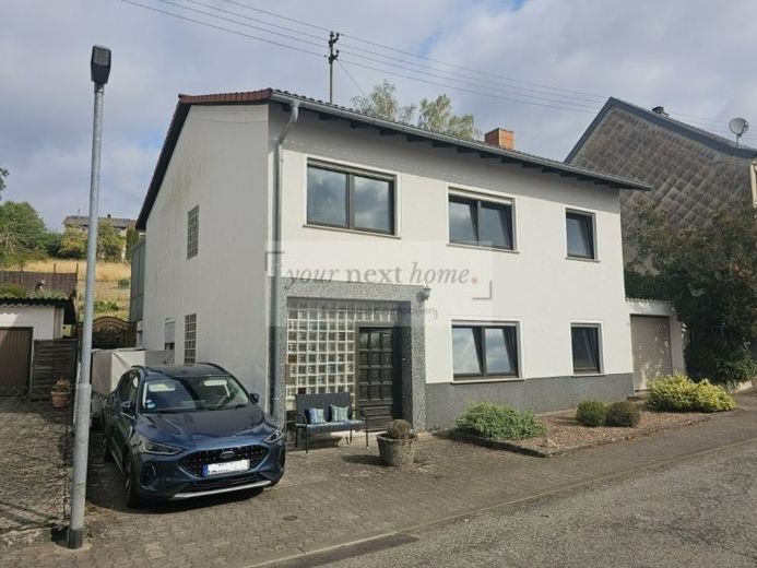Charmantes Einfamilienhaus mit großem Garten in ruhiger Wohnlage von Bexbach-Frankenholz – Foto 1