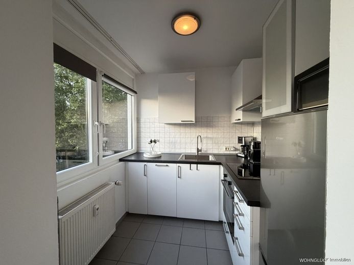 High end Apartment mit Fernblick – Küche