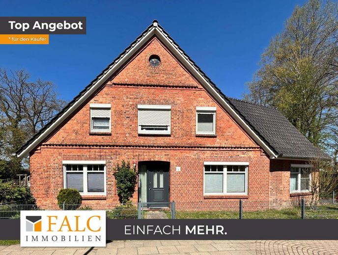 Einfamilienhaus mit Einliegerwohnung und Baugrundstück in zentraler Lage von Himmelpforten – Bild 1
