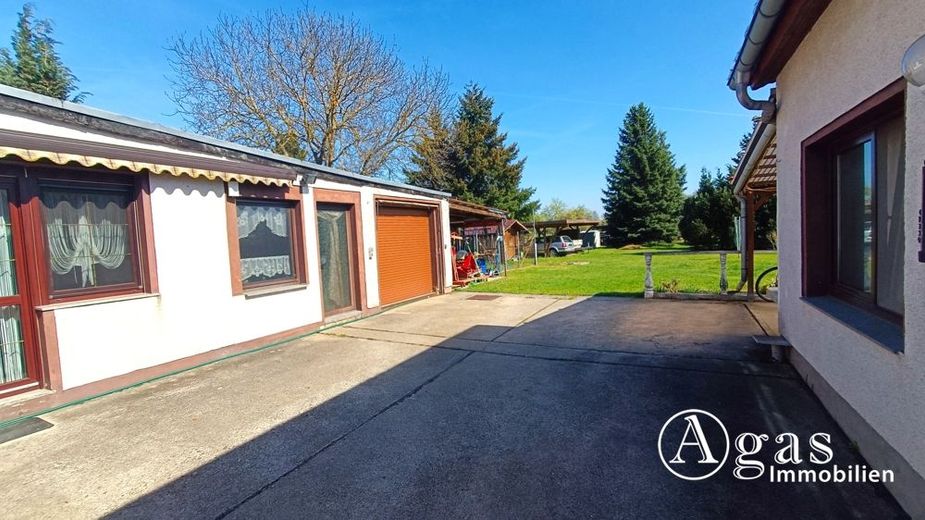 zwei vermietete Einfamilienhäuser mit Sonnen-Garten in Golßen / OT Gersdorf - mit Sanierungsbedarf – Durchgang