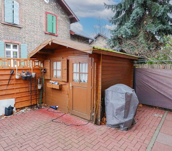 Wohnen in Bestlage: Stilvolle Doppelhaushälfte in der BASF-Kolonie – Gartenhaus