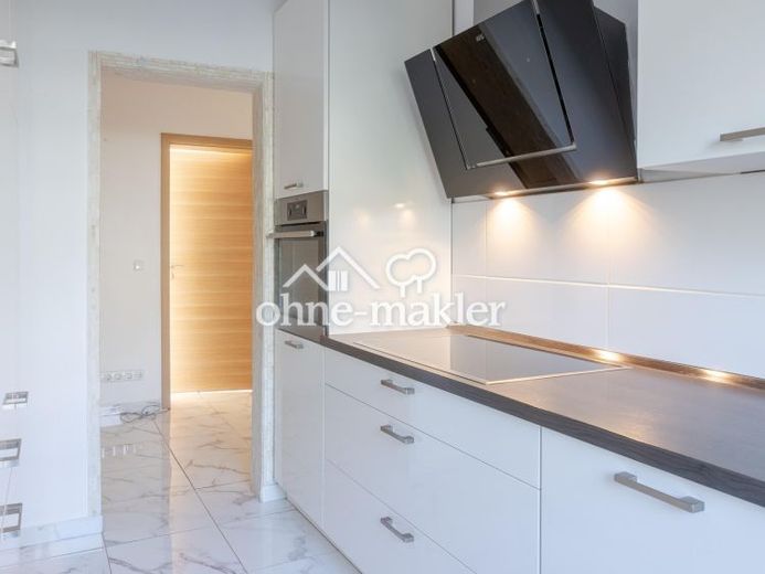 Wie neu: Modernisierte 3-Zimmer-Wohnung mit hochwertiger Küche in ruhiger Lage. – Foto 1