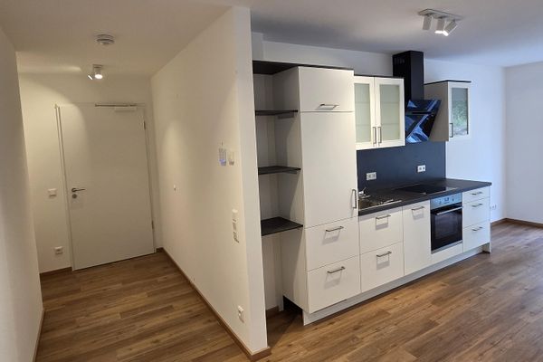 Neubau - Erstbezug - sofort verfügbar! Exklusive 2-Zi-Wohnung mit EBK und Garten sowie Tiefgarage