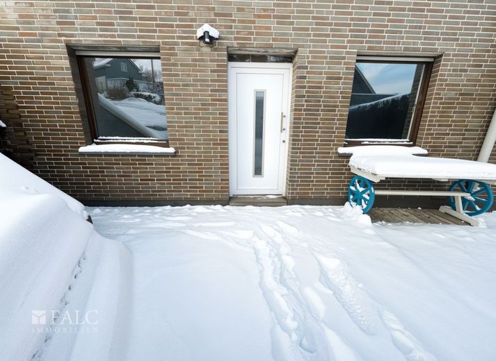 Großzügiges Zweifamilienhaus mit vielseitiger Nutzung in gefragter Wohnlage – Eingang Einliegerwohnung