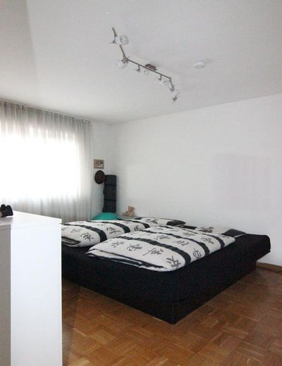 Licht tweekamerappartement – Schlafzimmer