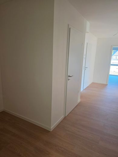Erstbezug: Moderne Obergeschosswohnung mit Balkon sowie energieeffizientem Wohnkomfort – Eingangsbereich
