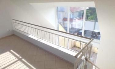 Galerie mit Balkonausblick