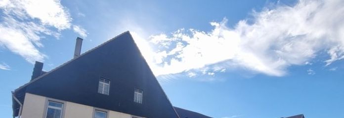 Former Zylinderhof estate on a 3,300 m² plot, 9 residential units and commercial premises.