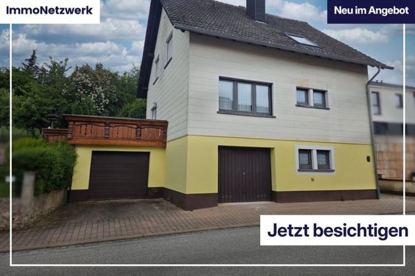 1‑Familienhaus mit Ausbaupotenzial: Garten, Südterrasse, 2 Garagen & optionale 2. Wohneinheit