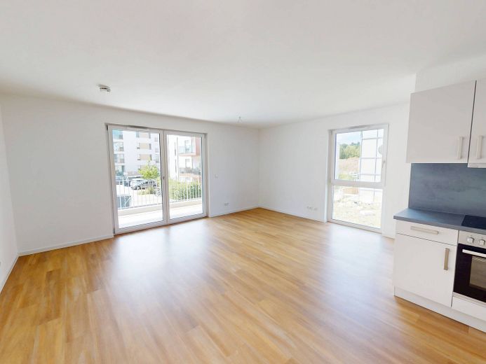 Modern wooncomfort: Lichtovergoten nieuwbouwappartement met 3 kamers, BALKON en INBOUWKKEUKEN – Ansicht I: Wohn- und Esszimme…