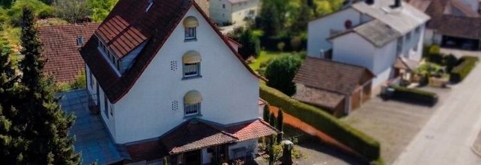 Investment am Bodensee – Ferienimmobilie mit Alpenblick und vielseitigem Entwicklungspotenzial