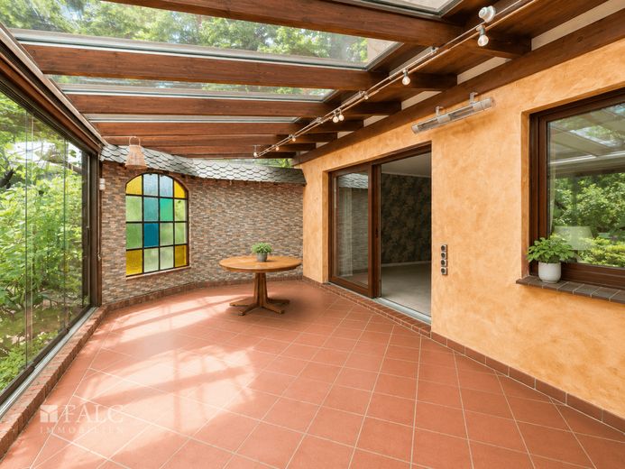 Gartenidylle mit Wintergarten-charmantes Einfamilienhaus zum Wohlfühlen in der Nähe von Langen – Wintergarten mit Eingang zum Wohnzimmer