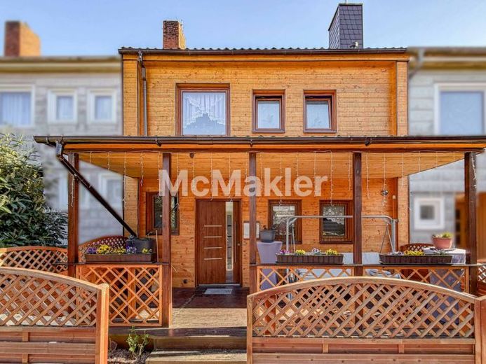 Modernisiertes und familienfreundliches Reihenmittelhaus mit Garten, Terrasse und Wintergarten – Foto 1