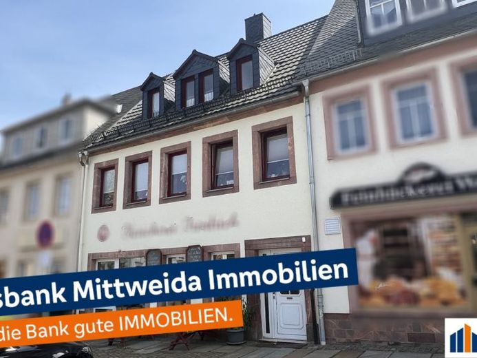 Wohnhaus mit Ladengeschäft im Erdgeschoss in zentraler Lage – Foto 1
