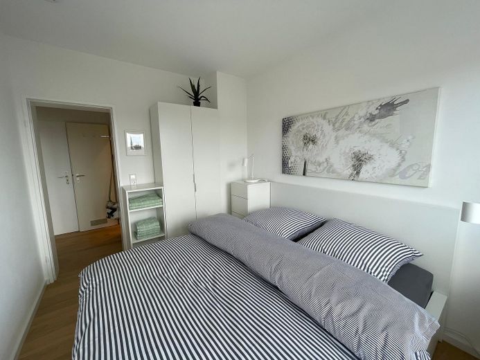 Above the rooftops of Norderney: Stylish 2-room apartment with sunny balcony – Separates Schlafzimmer