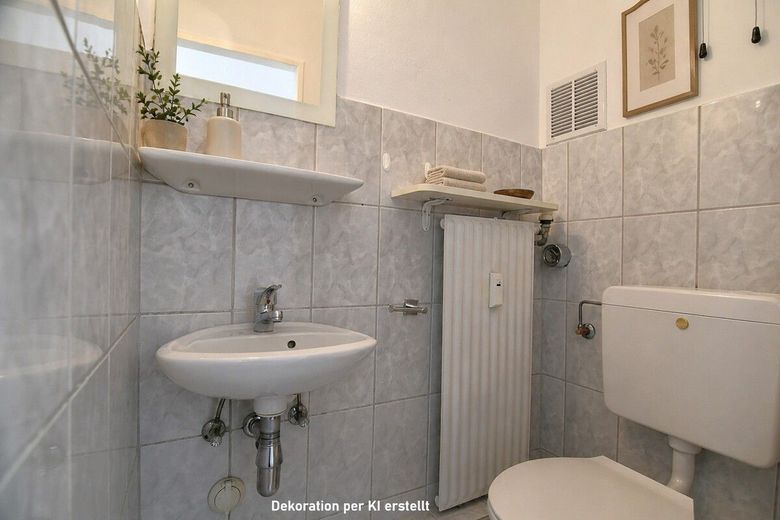 Top geschnittene 4 Zi Whg mit Lift nahe dem Kurpark – Gäste WC