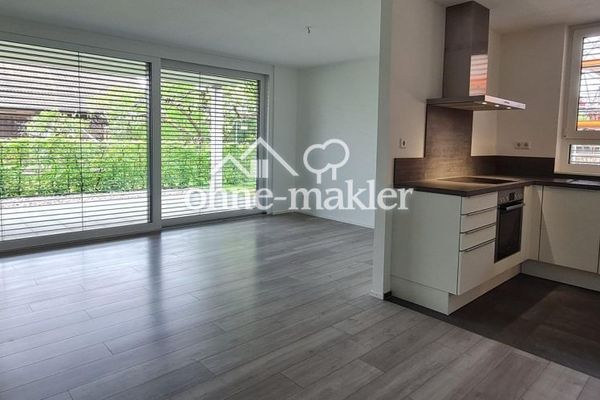 appartement moderne de 3,5 pièces au 1er étage avec ascenseur, cuisine équipée et balcon couvert