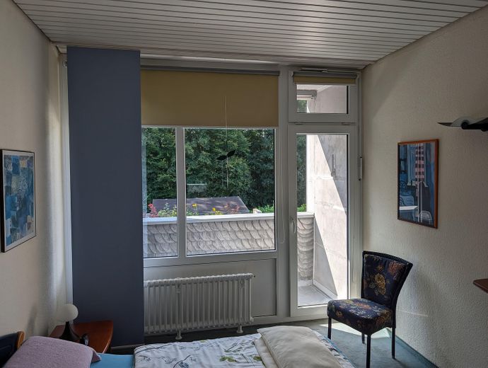 Schlafzimmer mit Balkon