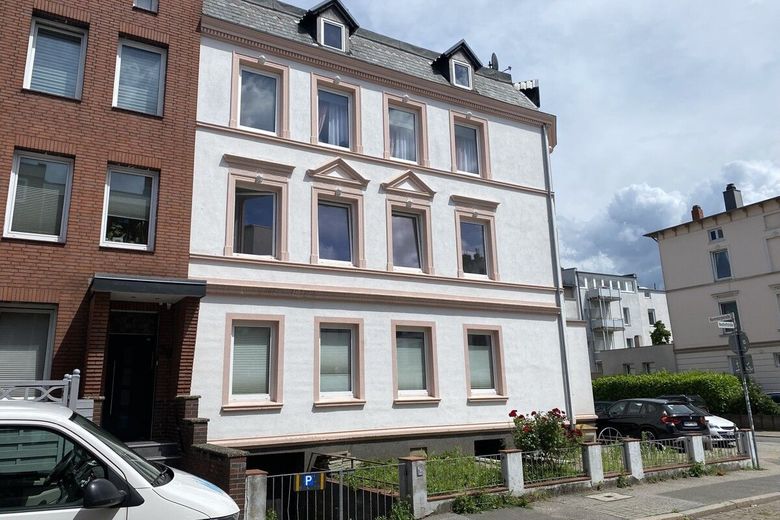 Mehrfamilienhaus mit Ausbaureserve in guter Lage – Warendorpstr. Garagen-Seite