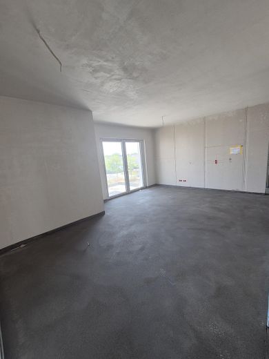 Wohnung im Bau, stadtnah im Hafenquartier Graf Bismark mit Balkon am Yachthafen/Kanal für 2 Personen – Wohn-Essbereich Whg. 27