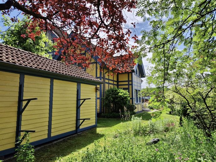 Casa de vacaciones con embarcadero propio en Hafendorf Rheinsberg – Kajakauflagen am Schuppen