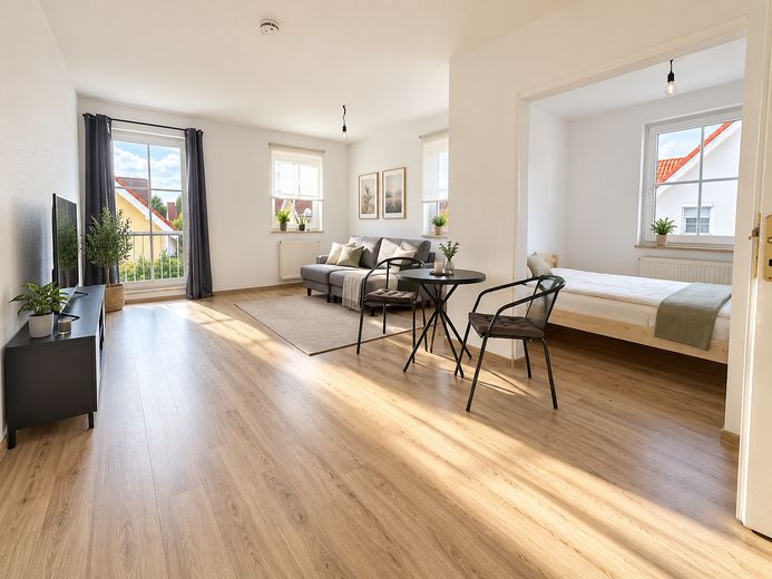 Leegebruch - Sonnige 1,5-Zimmer Eigentumswohnung, ruhig und im Grünen – Wohnzimmer mit Schlafnische