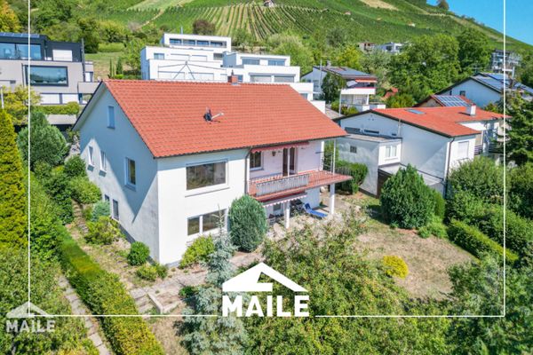 Premiumlage trifft Potenzial – Großzügiges 1- 3 Parteienhaus mit traumhafter Aussicht