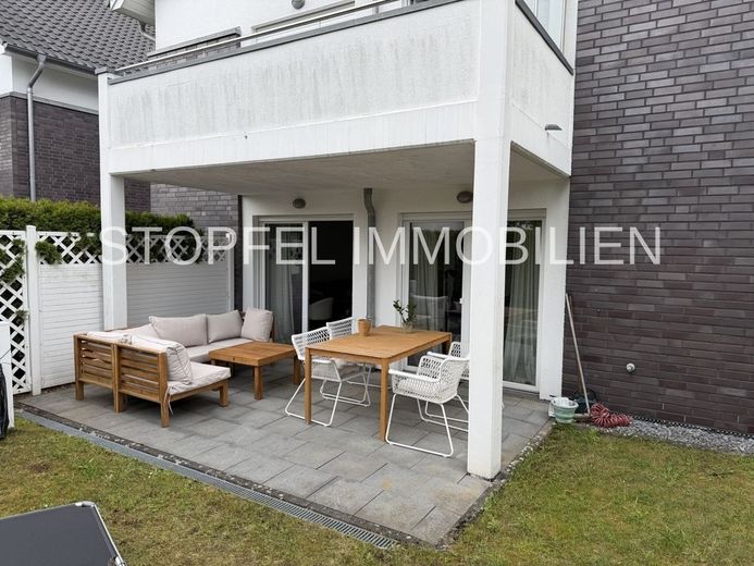 Moderne Terrassenwohnung mit Gartenanteil in Bielefeld - Jöllenbeck – Terrasse