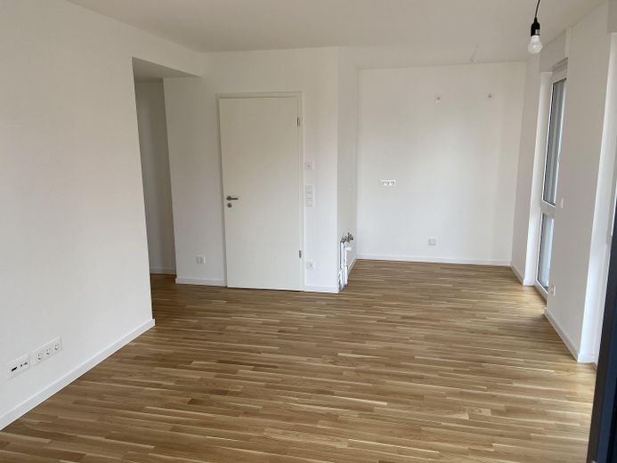 Uw nieuwe thuis in een groene omgeving: nieuwbouwappartement met 2 kamers en een privétuin – living room/kitchen area