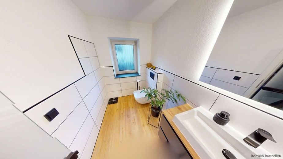 Vollständig saniertes kleines  Einfamilienhaus in Wohnungsgröße mit kleinem Garten – Badblick EG