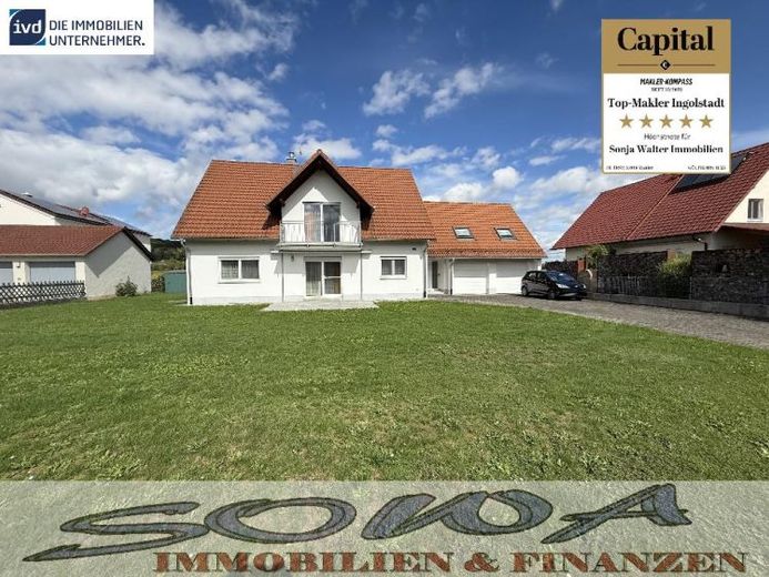 Move-in-ready two-family house with basement, double garage and heat pump - A property by SOWA Immobilien und Finanzen – Foto 1