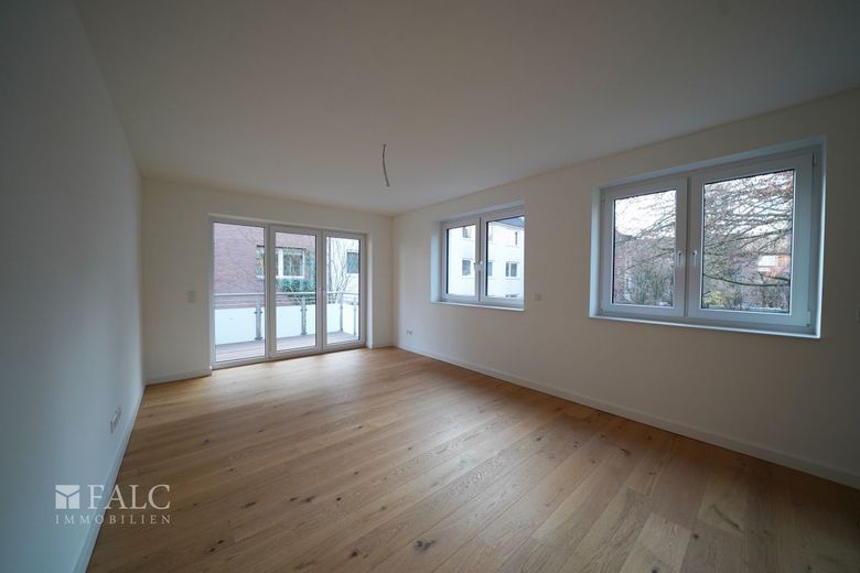 Energieeffizienter Neubau mit 3 Wohneinheiten und Business-Suite – WHG2-Wohnzimmer