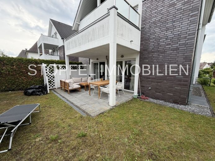 Moderne Terrassenwohnung mit Gartenanteil in Bielefeld - Jöllenbeck – Terrasse