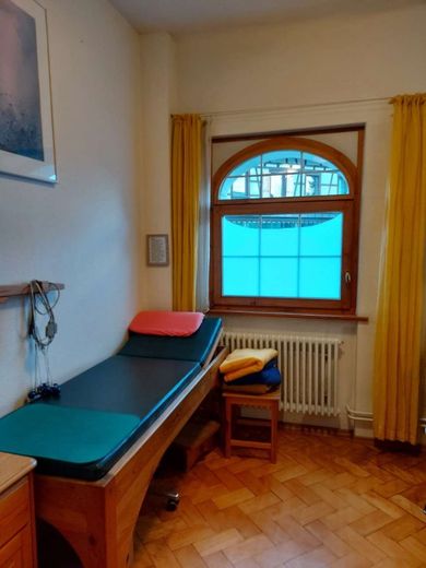 Wohnen und Arbeiten unter einem Dach – Behandlungsraum