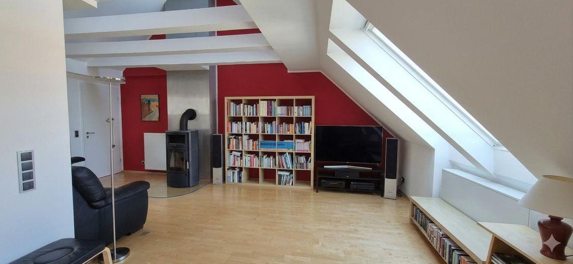 List with a view of the Eilenriede – Wohnzimmer mit Kamin